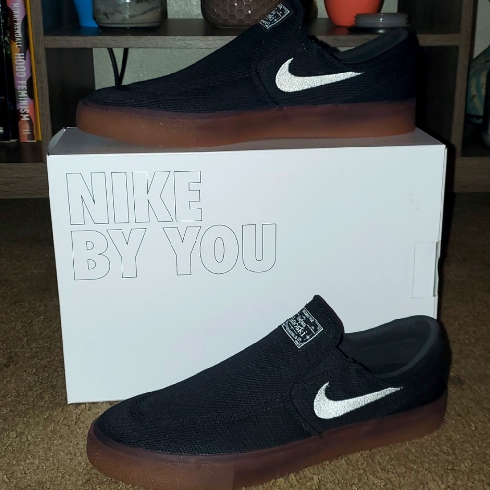 Black slip-on, Stefan Janoski, sneakers. Never worn and still in original box.